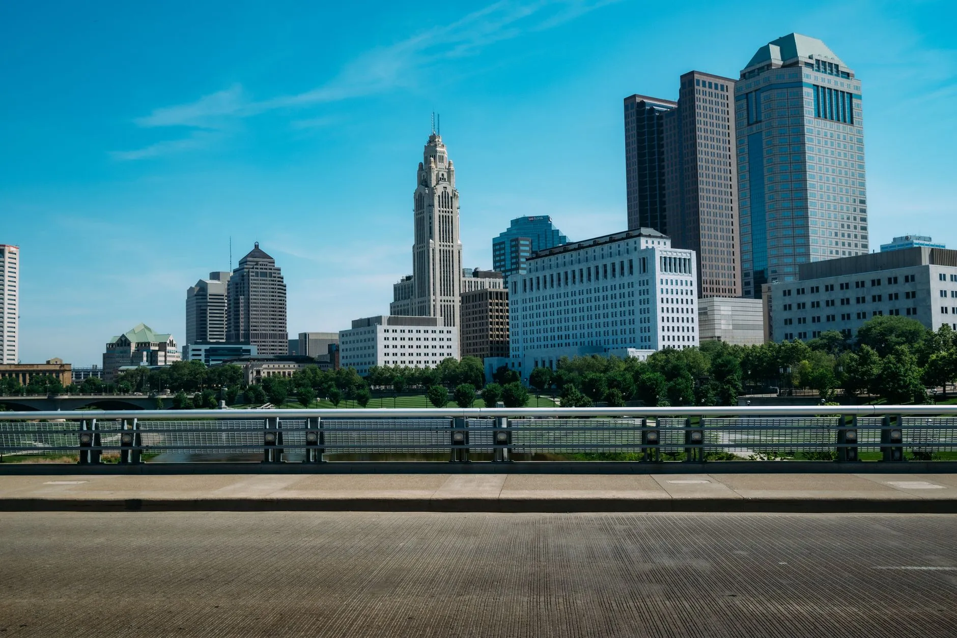 Downtown Columbus behind the Scioto River, with the white spire of the LeVeque Tower at the centre of the skyline.