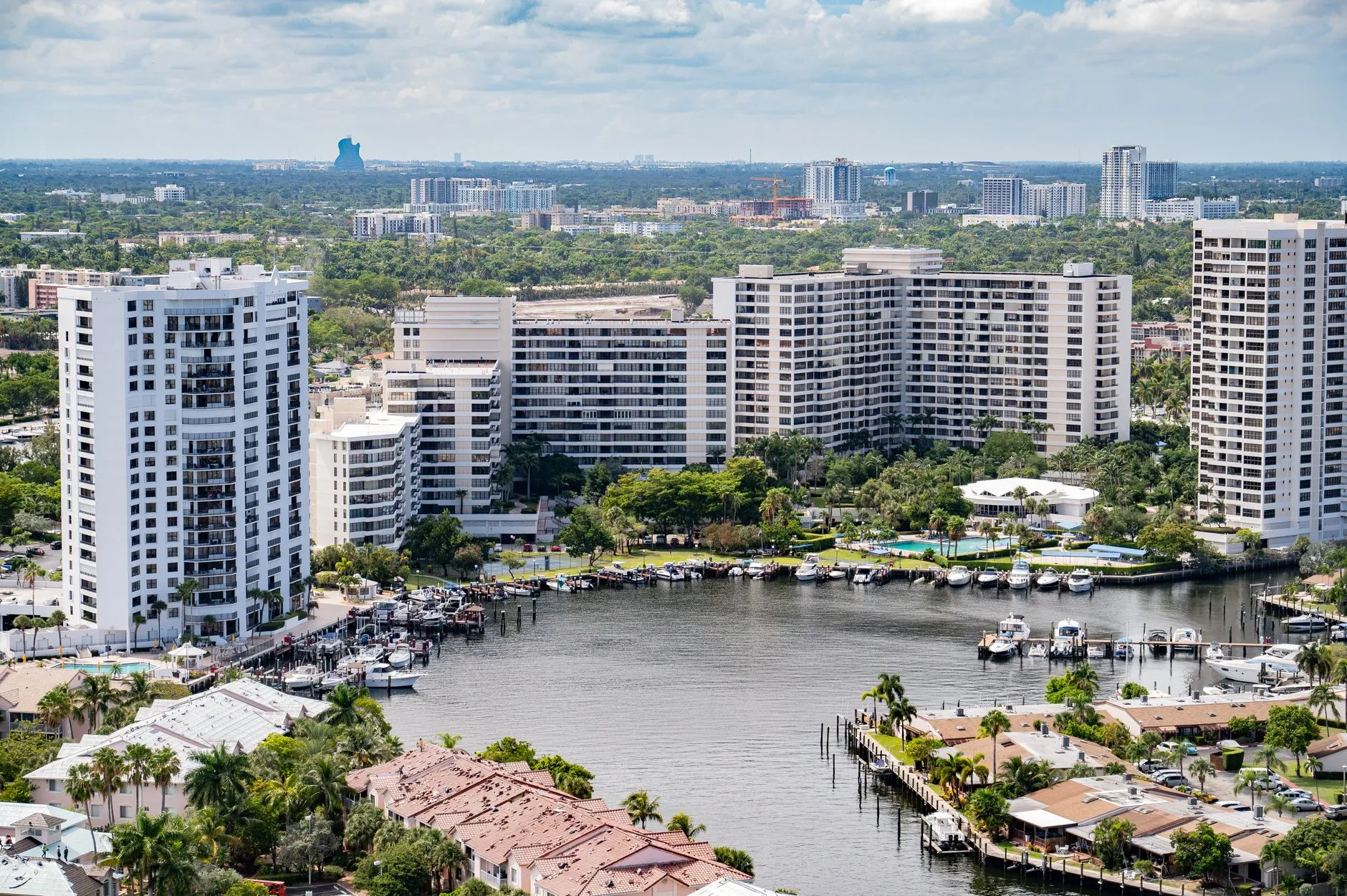 Hollywood's Intracoastal Waterway lined with marinas and condo towers, with the guitar-shaped Hard Rock hotel on the horizon.